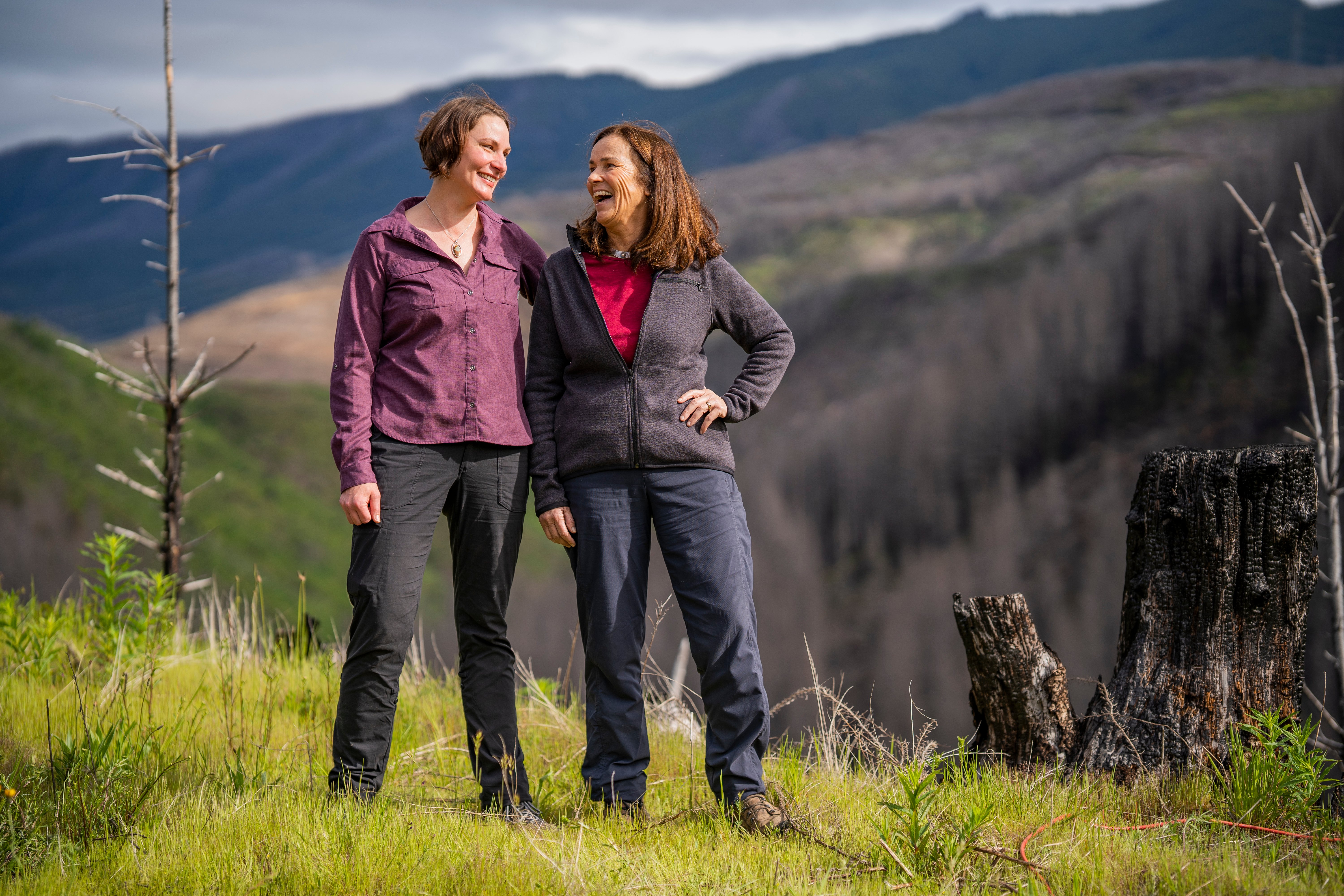 Two women smiling together.